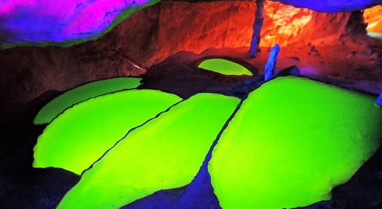 Fluorescent pools at the Can Marçà Cave in Ibiza