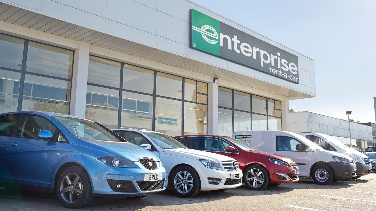 Range of cars parked outside an Enterprise branch
